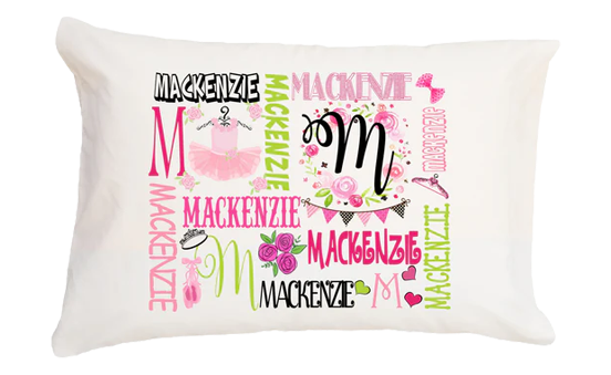 Pillow with various styles of the name 'Mackenzie' printed on it.