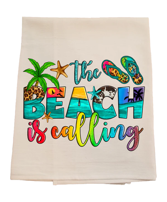 Beach-themed towel with colorful text and graphics on a white background