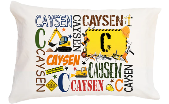 Pillow with 'CAYSEN' text in various colors and construction-themed graphics on a white background