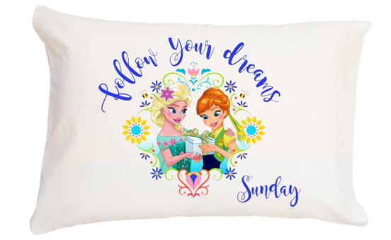 Pillow with cartoon characters and text 'Follow your dreams Sunday' on a white background
