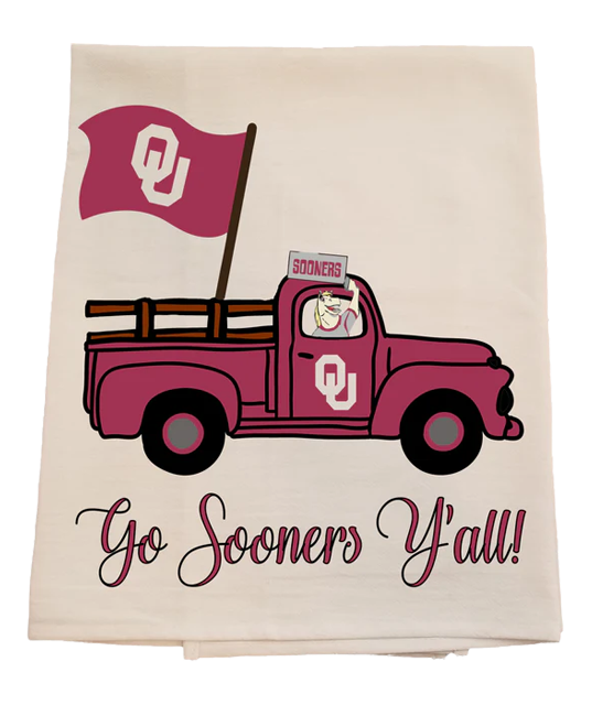 Tea towel with a pink truck and Oklahoma flag, featuring 'Go Sooners Y'all!' text.