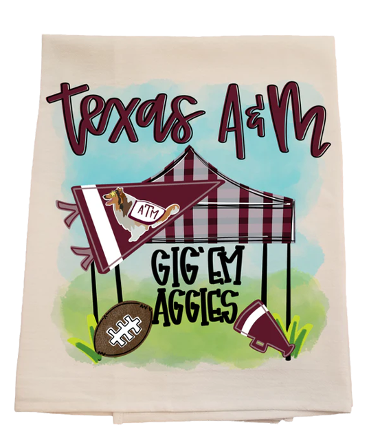 Decorative towel with 'Texas A&M Gig 'Em Aggies' text and football graphics on a white background