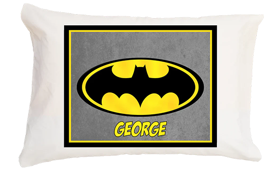Pillow with Batman logo and name 'George' on a white background
