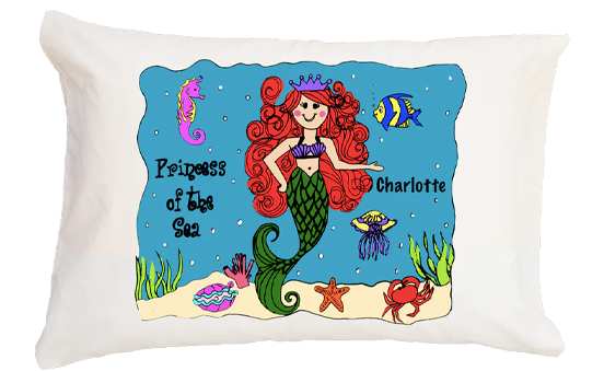 Decorative pillow with a mermaid design and personalized text on a white background