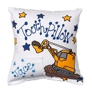 Decorative pillow with a tooth fairy design featuring a tooth, stars, and a teddy bear.