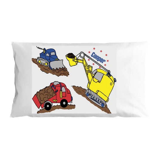 Pillow case with construction vehicle illustrations and the name 'Cooper' on a white background