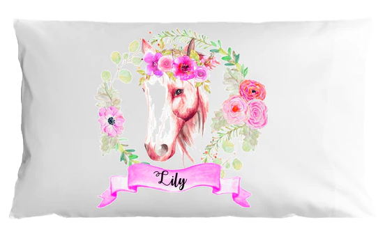 Pillowcase with a unicorn design and floral elements on a white background