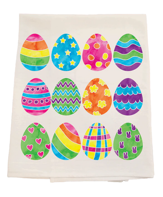 Decorative towel with colorful Easter egg designs on a white background