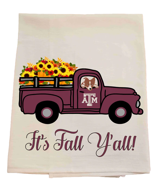 Tea towel with a vintage truck, flowers, and 'It's Fall Y'all!' text on a white background