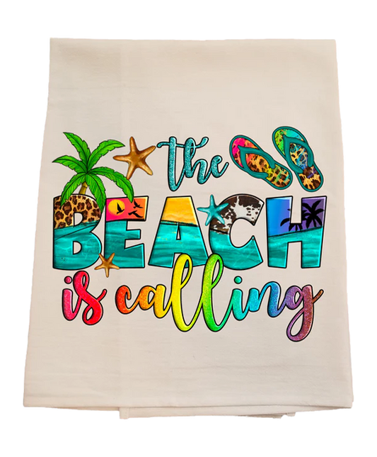 Beach-themed towel with colorful text and graphics on a white background