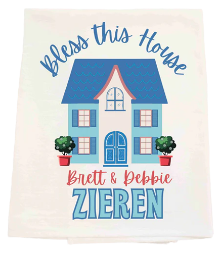 Decorative towel with a house illustration and text on a white background