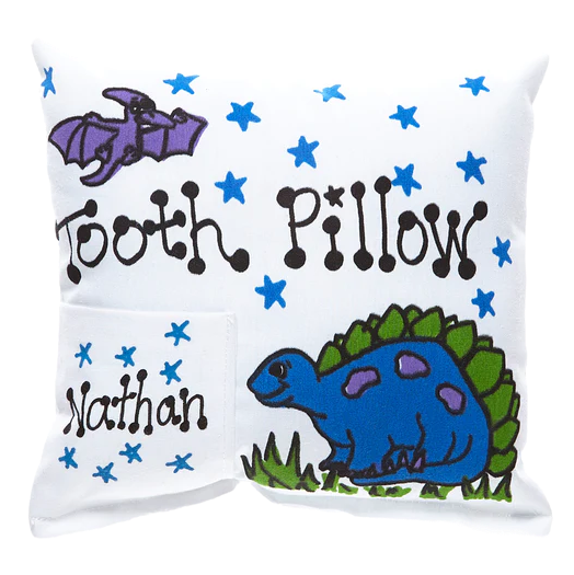 Tooth pillow with dinosaur design and text on a white background