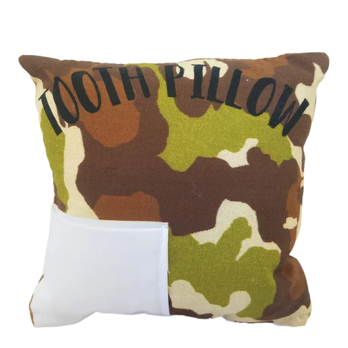 Camouflage-patterned pillow with 'TOOTH PILLOW' text on a white background