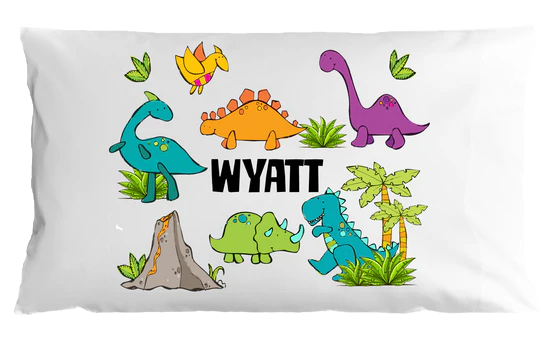 Pillow case with colorful dinosaurs and the name 'Wyatt' on a white background