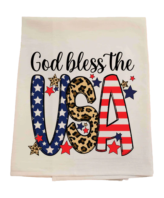 Towel with 'God bless the USA' text in American flag and leopard print design on a white background
