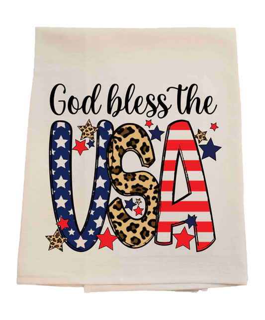 Towel with 'God bless the USA' text in American flag and leopard print design on a white background