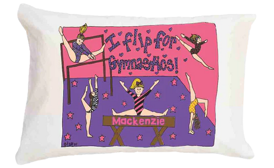 Decorative pillow with gymnastics-themed design and text on a white background