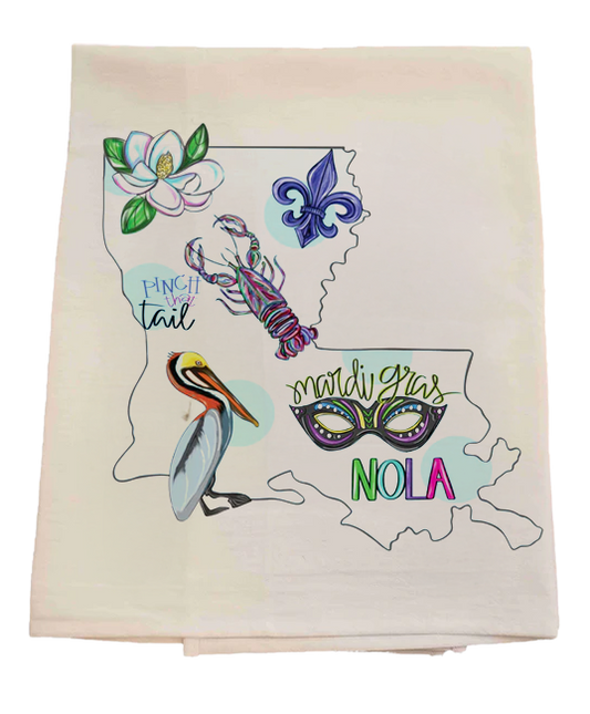 Decorative towel with Mardi Gras-themed designs on a white background