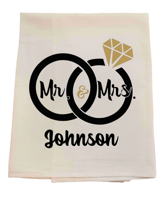 Folded towel with 'Mr. & Mrs.' and 'Johnson' text on a gradient background marriage wedding