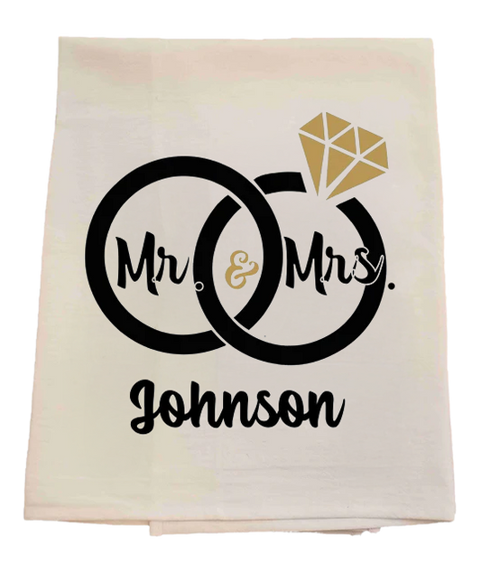 Folded towel with 'Mr. & Mrs.' and 'Johnson' text on a gradient background marriage wedding