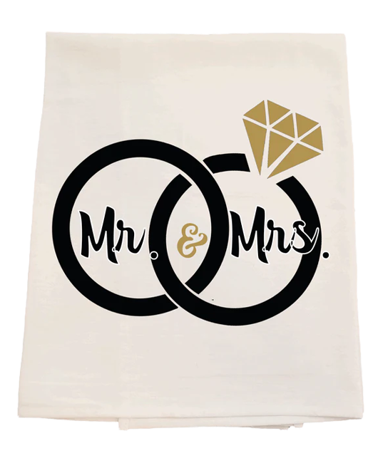 Tea towel with 'Mr. & Mrs.' design featuring rings and a diamond on a white background