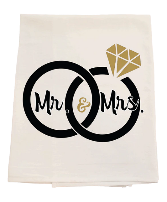 Tea towel with 'Mr. & Mrs.' design featuring rings and a diamond on a white background