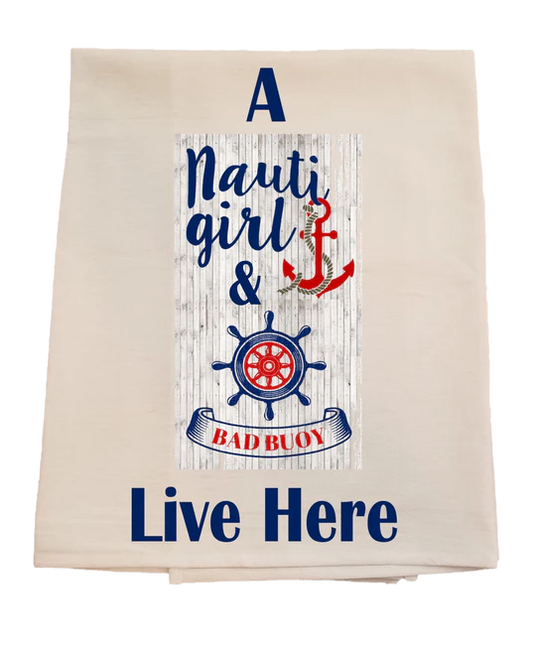 Beige towel with nautical design and text 'A Nauti girl & BAD BUOY Live Here' on a white background