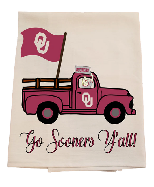 Tea towel with a pink truck and Oklahoma flag, featuring 'Go Sooners Y'all!' text.