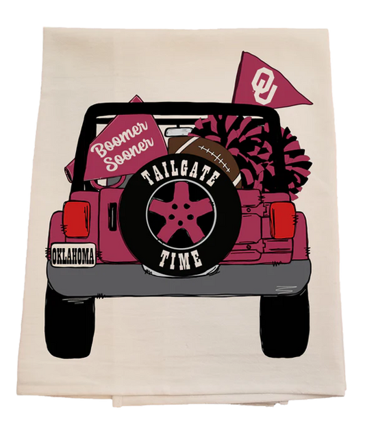 Beige towel with a graphic of a pink jeep, football, and 'Tailgate Time' text on a white background