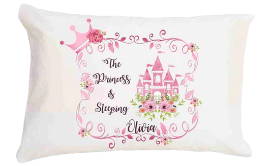 Decorative pillow with princess castle design and personalized text on a white background