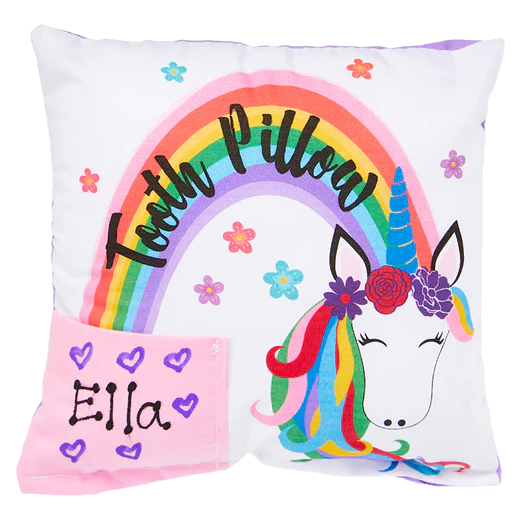 Unicorn-themed tooth pillow with rainbow, flowers, and name 'Ella' on a white background