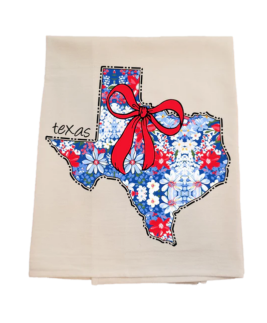 Floral Texas-shaped towel with a red bow on a beige background