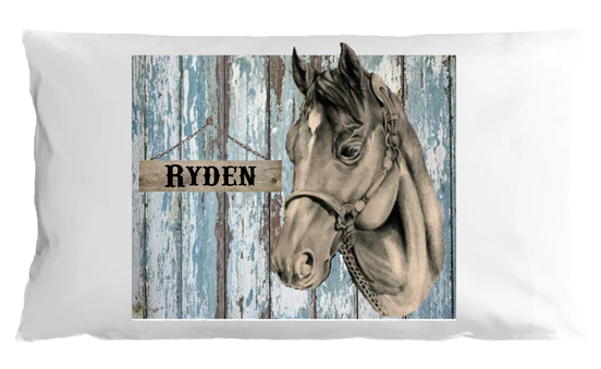Pillow with horse design and 'Ryden' sign on wooden background