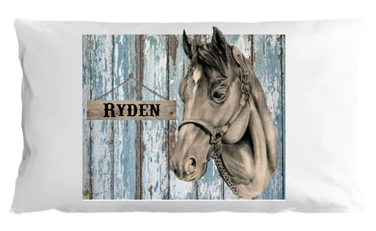 Pillow with horse design and 'Ryden' sign on wooden background
