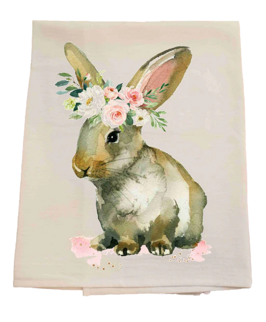 Floral towel with a rabbit design on a white background