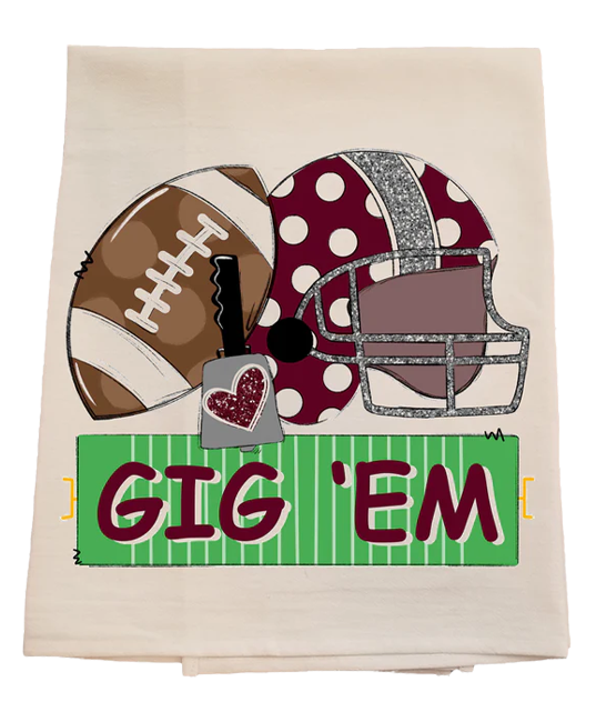 Decorative towel with football, helmet, and 'GIG 'EM' text on a white background
