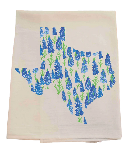 Floral patterned towel with blue and green Blue Bonnet flowers on a beige background