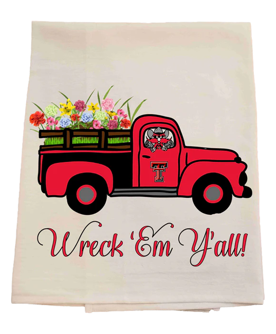 Floral-themed towel with a red truck and 'Wreck 'Em Y'all!' text on a white background