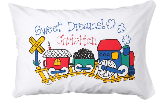 Children's pillowcase with a train design and 'Sweet Dreams Christian' text on a white background