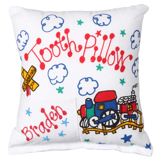 Children's tooth pillow with train design and colorful graphics on a white background