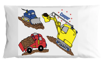 Children's pillowcase with construction vehicle illustrations and the name 'Cooper'.