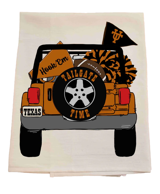 Decorative towel with a graphic of a jeep, tailgate, and football-themed text on a white background.
