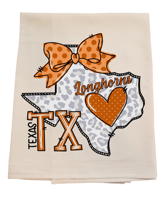 Decorative towel with Texas Longhorns design featuring a bow, heart, and state outline.