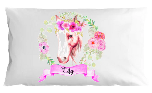 Pillowcase with a unicorn design and floral elements on a white background